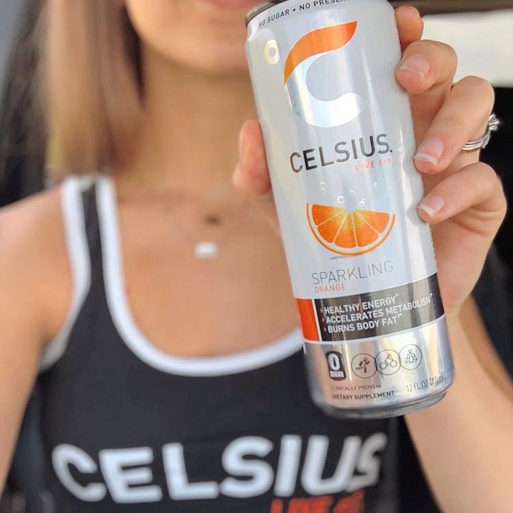 image of a sparkling orange celsius can being_yythk